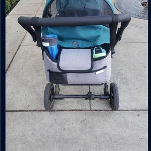 Gray Stroller organizer with cup holders